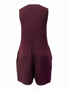 Rear view of deep burgundy sleeveless romper showing back seam and smooth fabric texture
