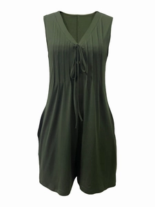 Detail of dark green sleeveless romper with V-neck pleats and front drawstring tie