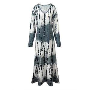 Detailed close-up of V-neck tie-dye long sleeve dress with black and grey ink patterns