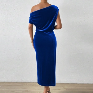 Detail of royal blue velvet off-shoulder dress showing smooth back fit and rich fabric texture