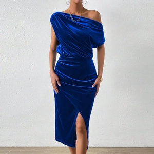 Detail of royal blue velvet dress showing off-shoulder neckline and pleated texture