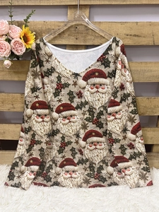 Women's V-neck long sleeve top with festive Santa Claus and holly Christmas patterns