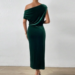 Close-up of the elegant dark green velvet off-the-shoulder evening dress back detail