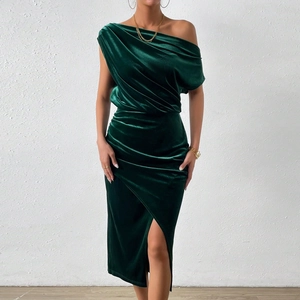 Detail of elegant dark green velvet dress with asymmetric draped off-shoulder neckline