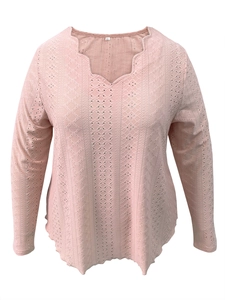 Detail view of scalloped V-neckline and hollow-out lace texture on dusty pink long sleeve top