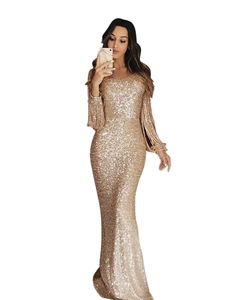 Elegant gold sequin evening gown with long sleeves, fringe details and a slim mermaid hem