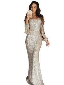 Sparkly champagne long sleeve sequin evening gown with tassel sleeves and fishtail hem