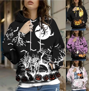 Close-up of Halloween digital prints on hoodies featuring black cats and pumpkins