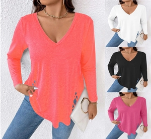 Detailed close-up of V-neck long sleeve top showing unique hollow diamond-cut hem and colors