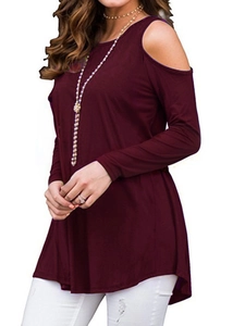 Detail view of burgundy cold shoulder long sleeve top with a round neckline