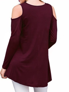 Detail view of burgundy cold shoulder long sleeve top with a loose curved hem for women
