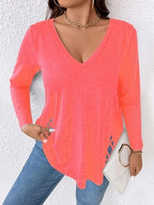 Chic V-neck long sleeve top in coral pink with unique cutout hem and knit texture