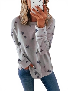 Women's light grey oversized sweatshirt with black star print and long sleeves