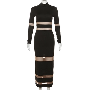 Detail of high neck black dress with mesh patchwork and sheer horizontal stripes
