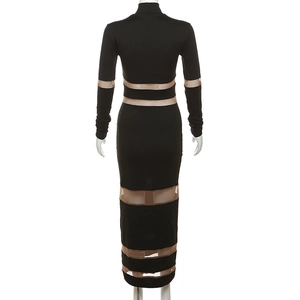 Detailed back view of a slim-fit black maxi dress featuring mesh paneling and a high collar