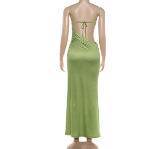 Detail of green floral maxi dress featuring an open back with delicate tie-up string