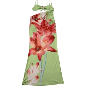 Detail of green floral maxi dress featuring side cutouts and a metal chest buckle