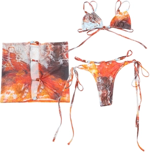 Detailed view of 3-piece floral bikini set with mesh skirt and decorative wooden beads