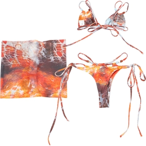 Detailed view of printed three-piece bikini set with tie-side briefs and matching sarong