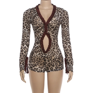 Detail of sexy leopard print bodysuit featuring deep V-neckline and ruffled mesh trim
