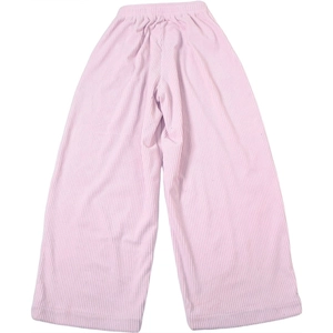Close-up of light pink high waist trousers with vertical ribbed knit texture