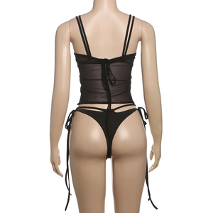 Detail view of the back drawstring lace-up design on a black sheer mesh lingerie set