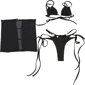 Detail of three-piece black bikini with colorful beads and matching mesh sarong cover-up