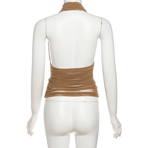 Detail view of khaki halter neck top featuring ruched mesh fabric and backless design