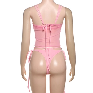Rear view of pink mesh bikini set with cross-back lace-up details on a mannequin