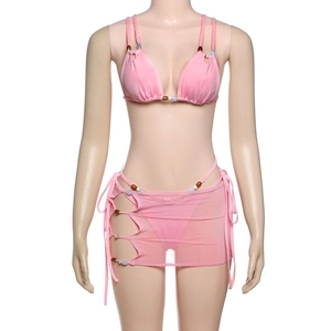 Detailed view of pink 3-piece bikini set with beaded straps and mesh tie-side skirt
