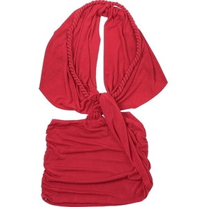 Detail of red halter dress featuring a knotted cutout and textured ruched fabric