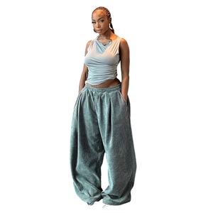 Women's stylish light blue tank top and sage green corduroy wide-leg pants set