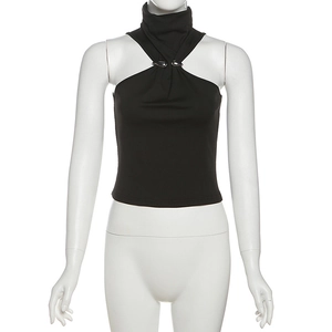 Detail of high neck halter top featuring silver oval buckles and gathered chest pleats