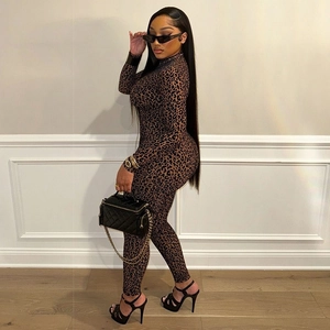Side view of long-sleeved leopard print bodysuit showing slim fit and elastic fabric