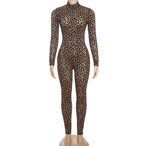 Close-up of high-stretch leopard print bodysuit featuring a sleek turtle neck and long sleeves