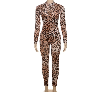 Close-up of high-neck leopard print jumpsuit with sheer mesh and slim fit fabric