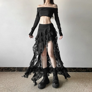 Detail of black off-shoulder crop top and tiered asymmetrical floral lace skirt