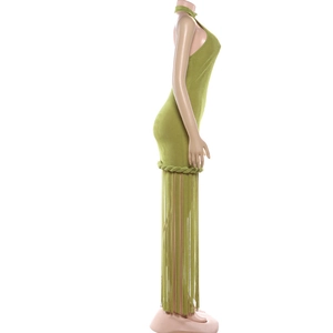 Detail of lime green halter dress featuring thick rope weave and long dense fringe tassels