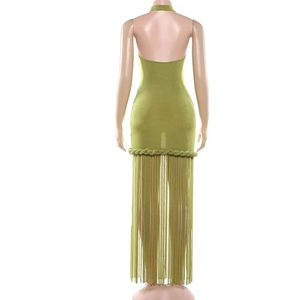 Detail of light green backless dress featuring bohemian fringe and woven waist rope