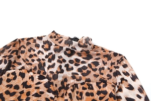 Detail of mock neck leopard print mesh bodysuit with hidden back zipper closure