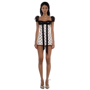 French vintage polka dot dress with black lace sleeves and large bow decoration