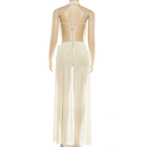 Detail of sheer cream mesh halter top and back lace-up closure on backless maxi dress set