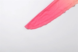 Detail of ombre pink and orange sleeve cuff with professional double-stitched hem