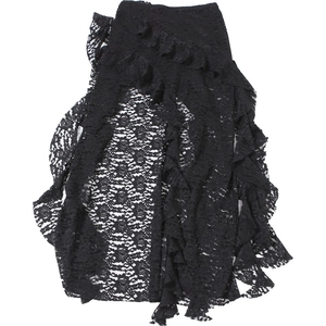 Detailed view of the black floral lace fabric with irregular ruffled edges and hem