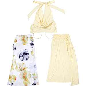 Detailed view of women's 3-piece set with yellow halter top and floral maxi skirt