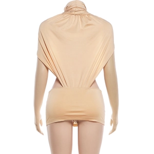 Close-up of the backless design and draped neck detail on this nude bodycon dress