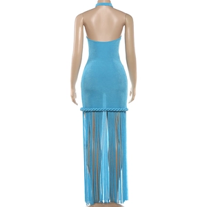 Detail of bright blue halter dress featuring a deep open back and long fringe hemline