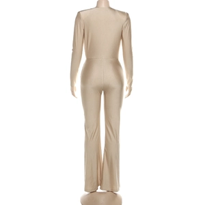 Back view of slim fit champagne jumpsuit with elegant long sleeves and flared leg design