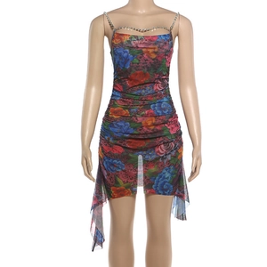 Detail of ruched floral bodycon dress with rhinestone chain straps and cutout neckline