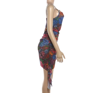 Detail of metal chain strap and ruched floral print dress side on white background